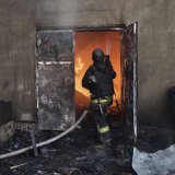 Un immeuble en flammes après une attaque de drones russes, en Ukraine. (Archive). KEYSTONE/EPA/SERGEY KOZLOV